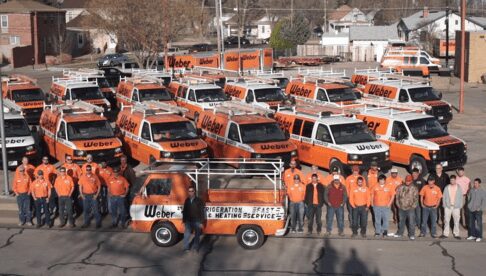 Orange van and people wearing an orange uniform
