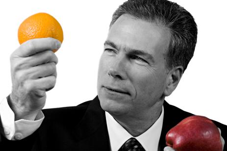 Man holding an orange